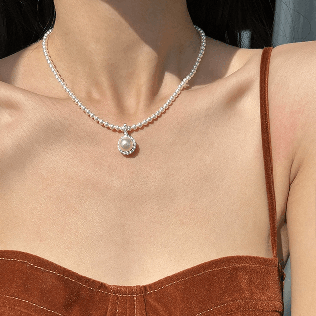 Pure natural pearl aurora freshwater Zhuji pearl millet bead necklace sunflower seedless necklace set simple pendant